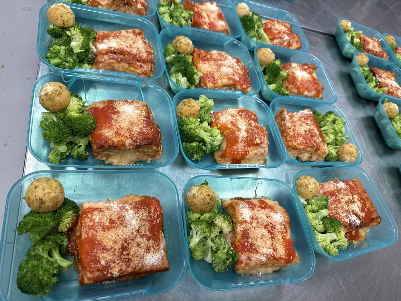 Lasagna with garlic knot and broccoli